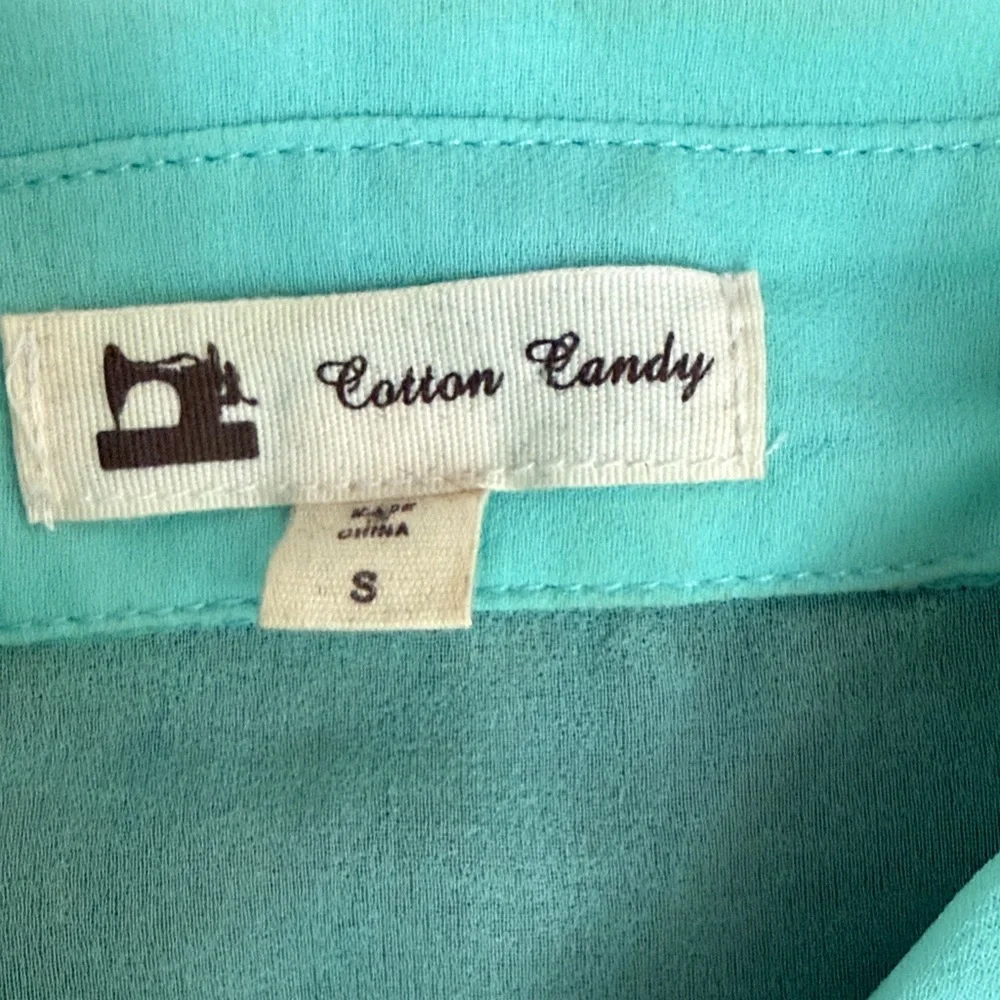 Cotton Candy Sleeveless Sheer Button-Front Blouse in Aqua Green - Picture 6 of 6